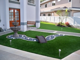 landscaped Synthetic lawn with bridge