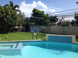 Synthetic turf around pool area